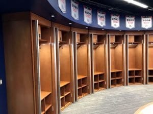Open basketball wood lockers for Gonzaga University in a round room.